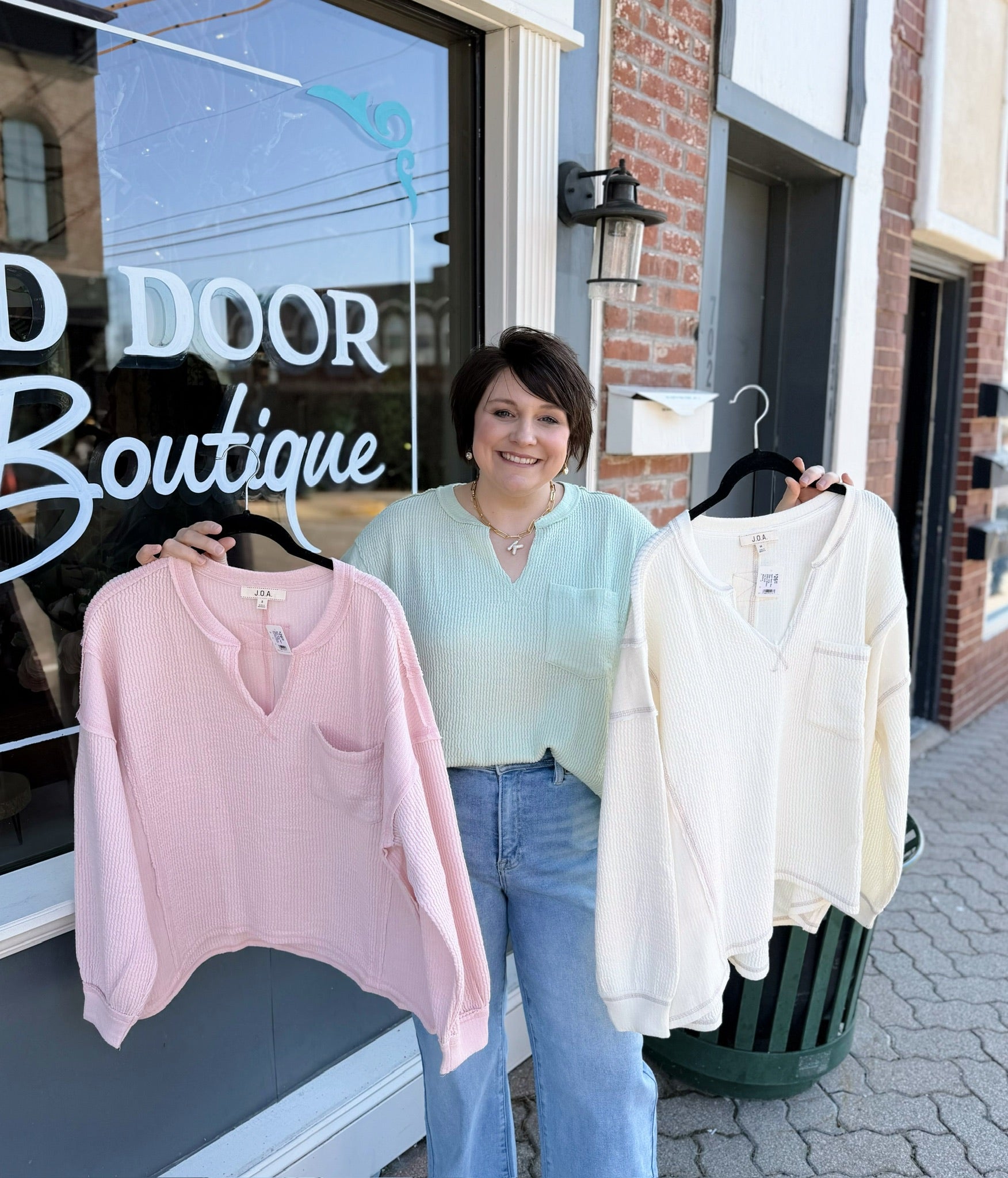 Split Neck Raw Edge Long Sleeve Ribbed Top
